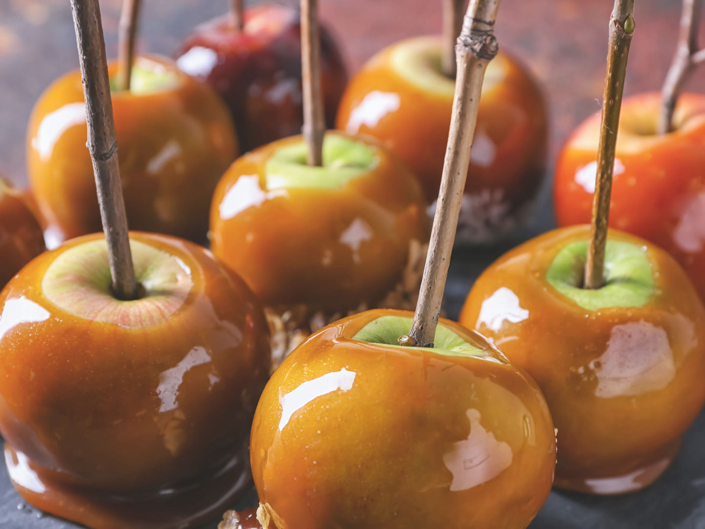 caramel apple on a stick, melted caramel up close shot